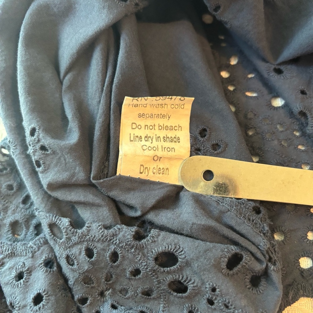Elegant Navy Eyelet Blouse with Bow-Tie Sleeves - Picture 8 of 8